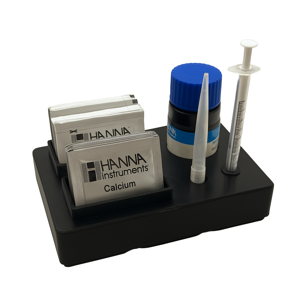 Black reagent organizer holding Hanna Checker test kit components for Alkalinity, Calcium, Nitrate, and Phosphate, displayed on white background.