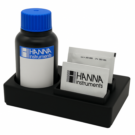 Black reagent organizer holding Hanna magnesium test kit components, including a reagent bottle with blue cap and white powder packets, displayed on a clean white background.